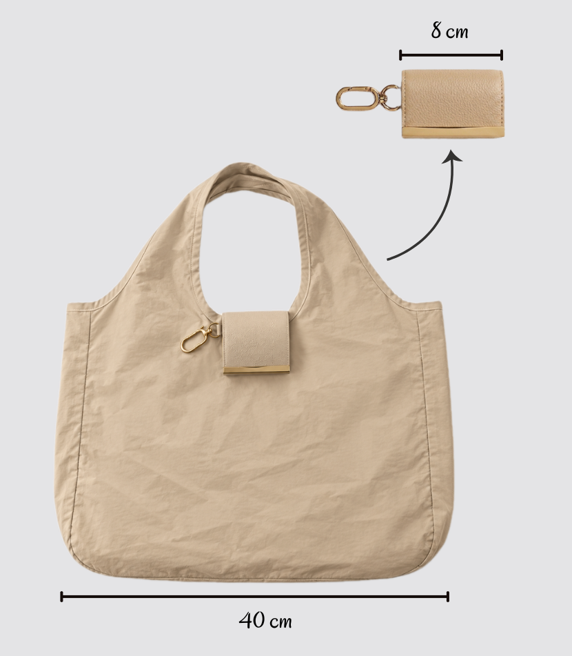 Beige foldable tote shown open and folded