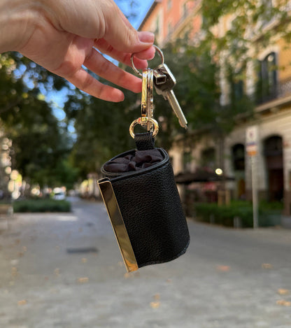 Black compact bag pouch clipped with keys