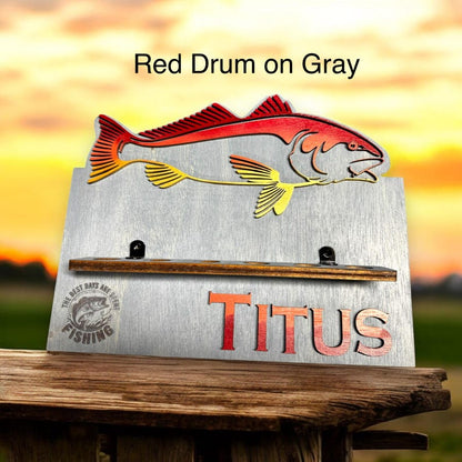 Colorful fish design personalized rod holder on gray wood